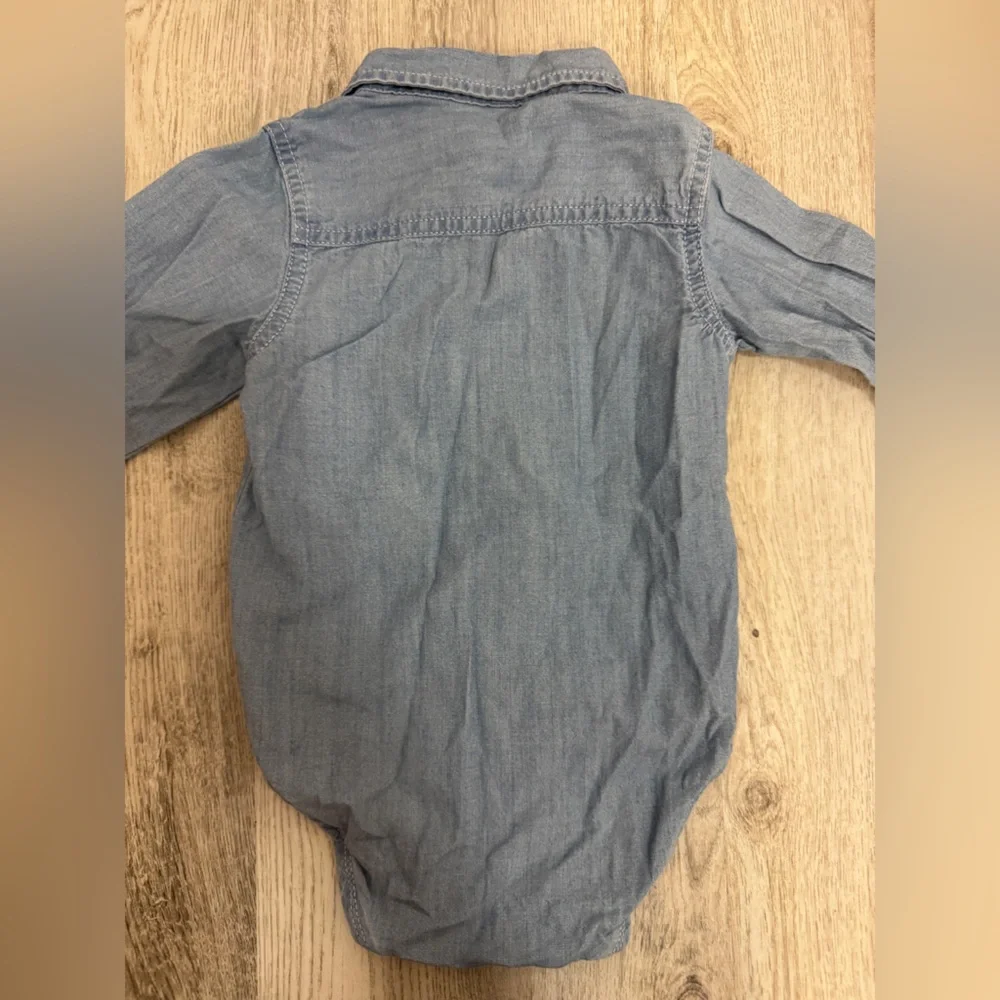 OshKosh B'gosh Blue denim long sleeve onesie